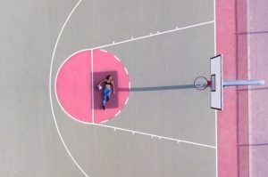 Girl resting on court